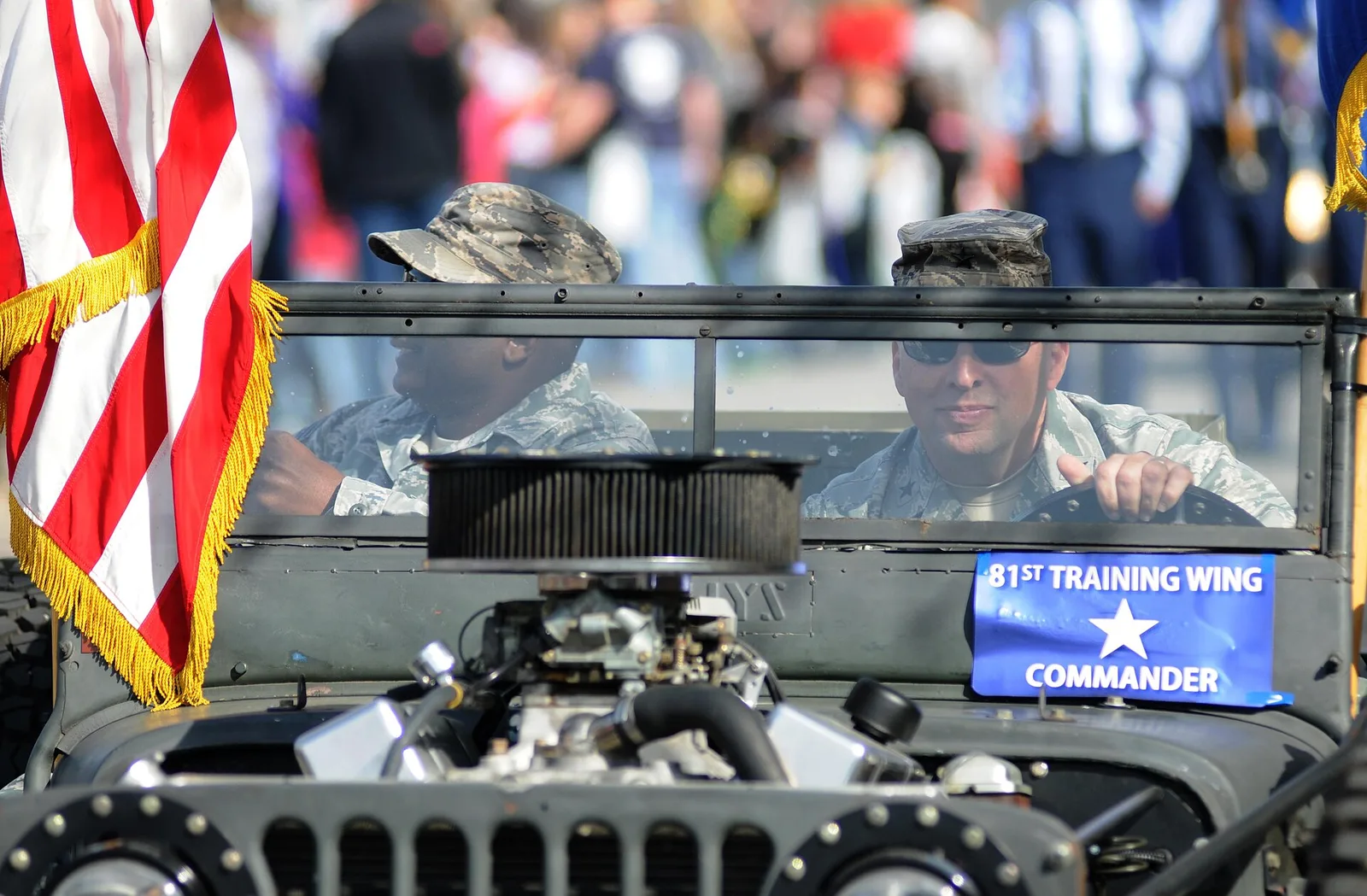 Air Force leaders from Keesler Air Force Base ride as grand marshals in the Jeff Davis Elementary School Mardi Gras parade in Biloxi.
