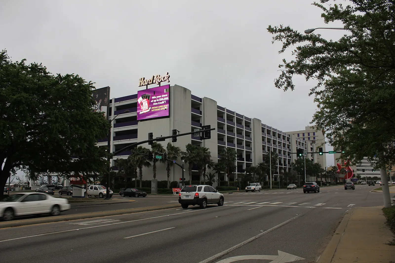 The Hard Rock Hotel and Casino's parking deck and guitar sign on Beach Boulevard in Biloxi.
