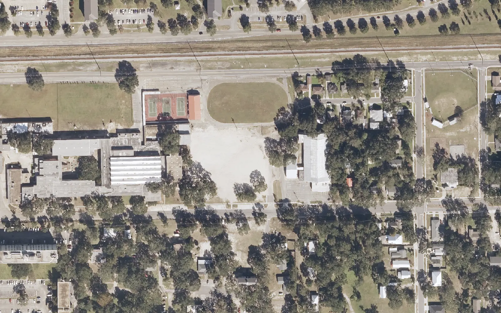 The Biloxi Upper Elementary School campus on Father Ryan Avenue, beside the railroad in central Biloxi, seen from the air.