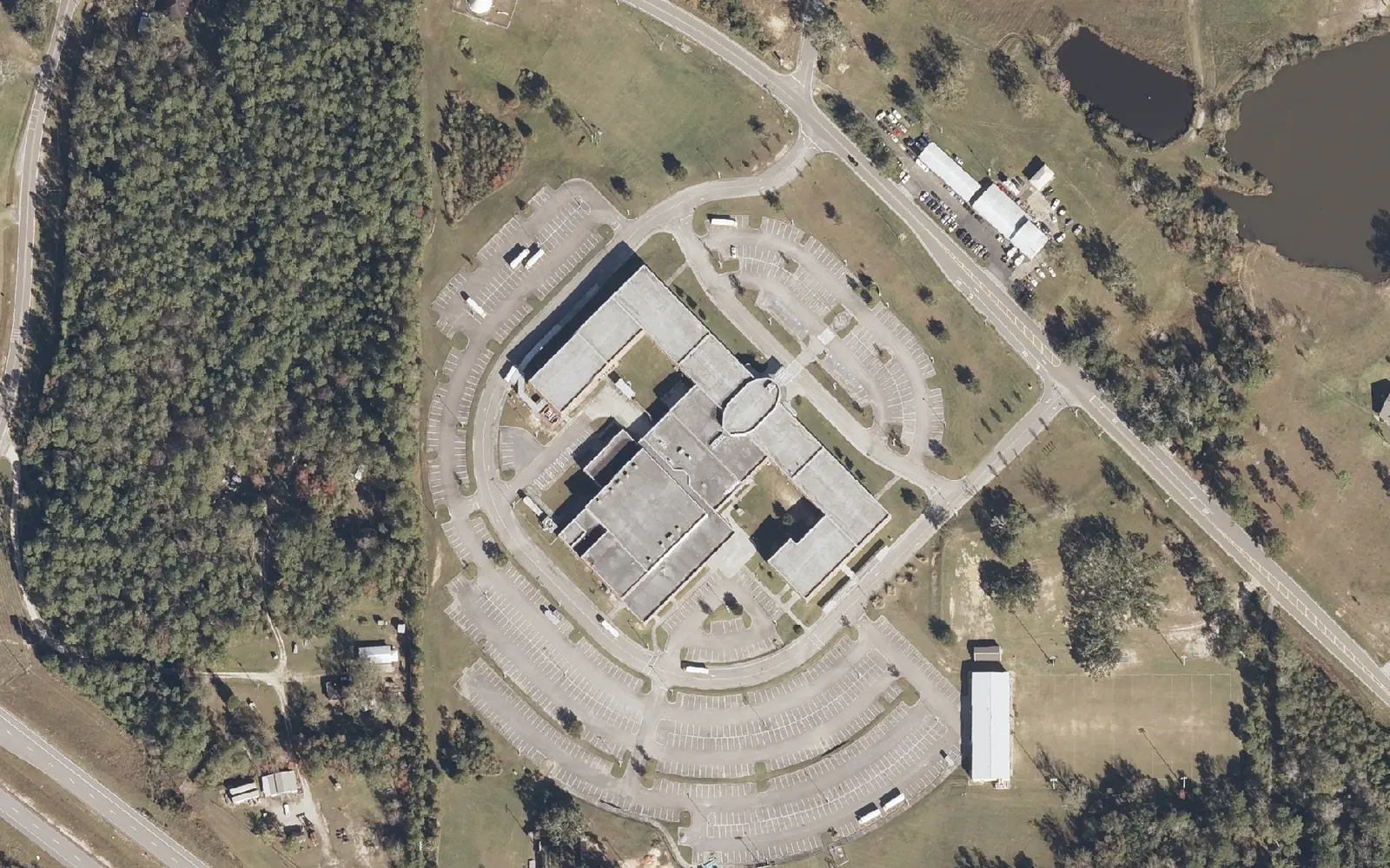 D'Iberville High School and its parking lots off Lamey Bridge Road, north of I-10, seen from the air.