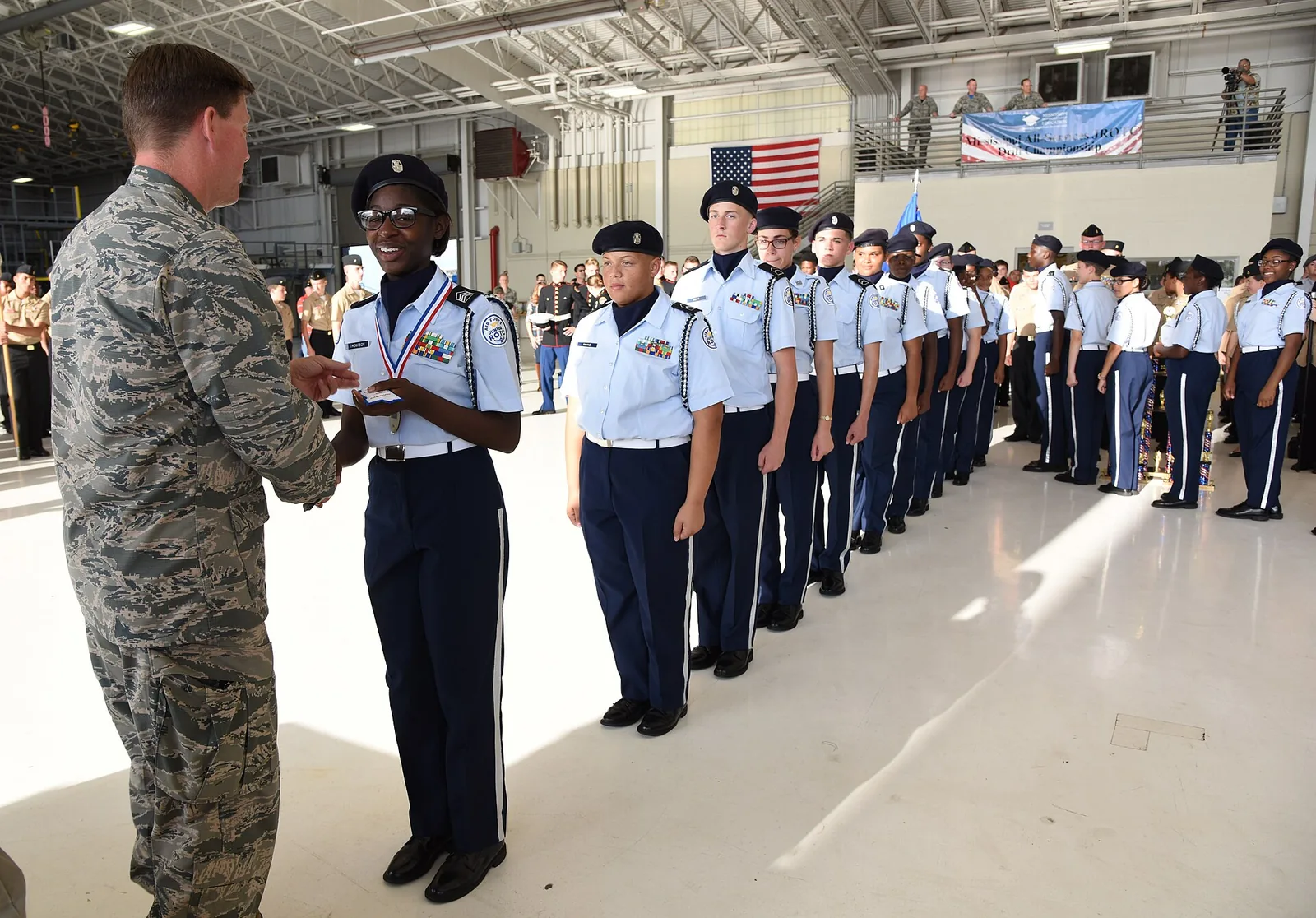 Biloxi High School Air Force Junior ROTC cadets receive medals at a statewide drill competition at Keesler Air Force Base.